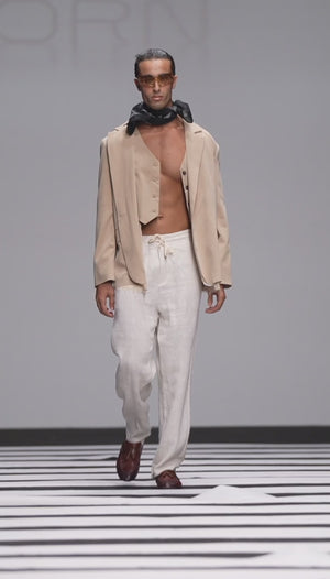Load and play video in Gallery viewer, TEXTURED TROUSER WITH WAIST TIE