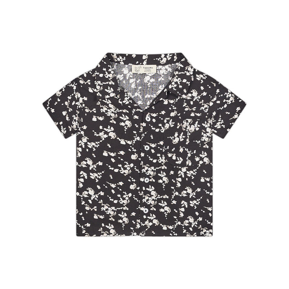 Boy's buttoned black floral shirt